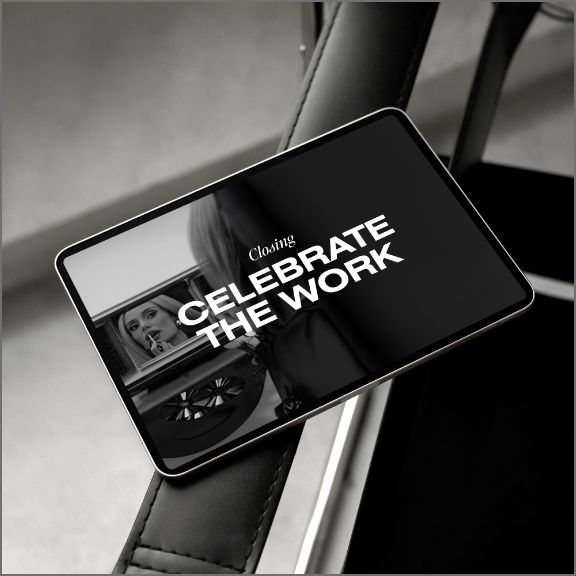 Tablet with "Celebrate the Work" on it